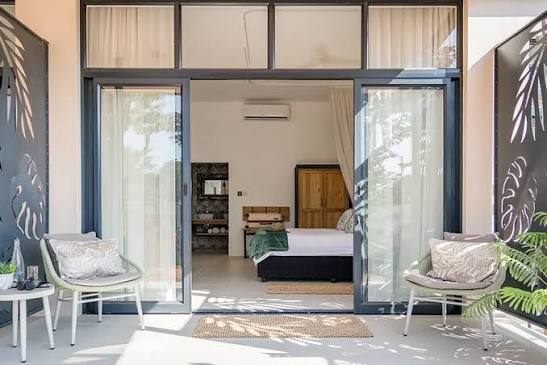 Riverside lodge room patio, Victoria Falls